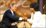 _933511_oprahhands300