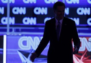 Republican presidential candidate Massachusetts Governor Mitt Romney leaves his podium during a break in the Republican presidential candidates debate in Jacksonville.