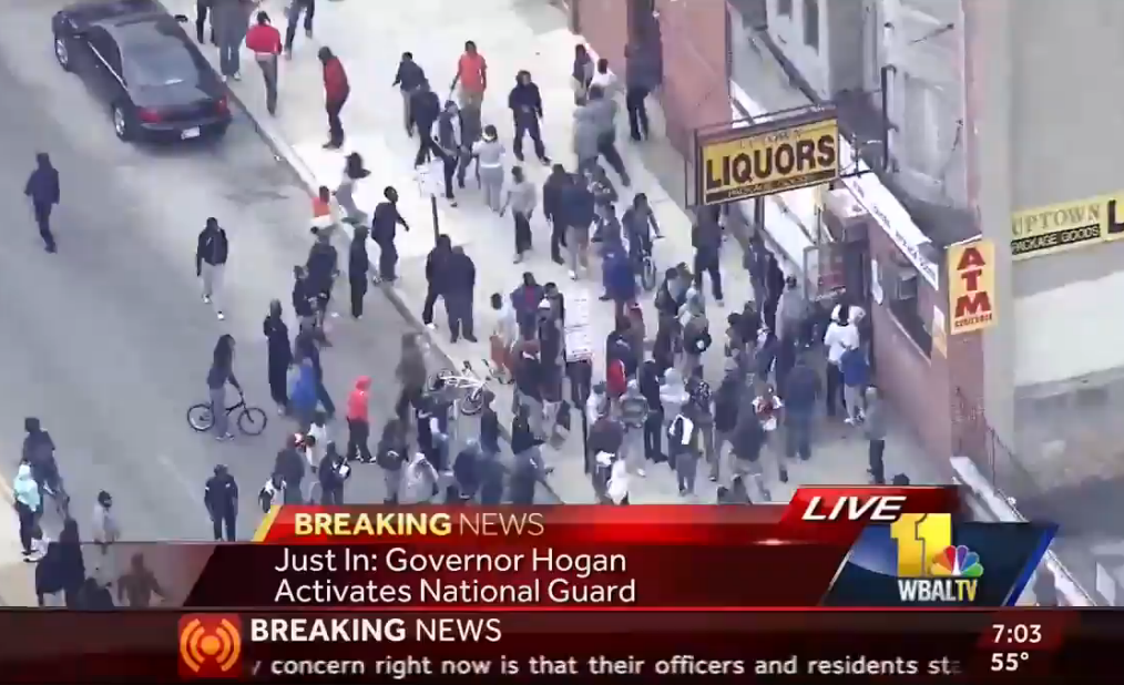 Video Shows Baltimore Rioters Pulling Man Out of Liquor Shop, Kicking Him