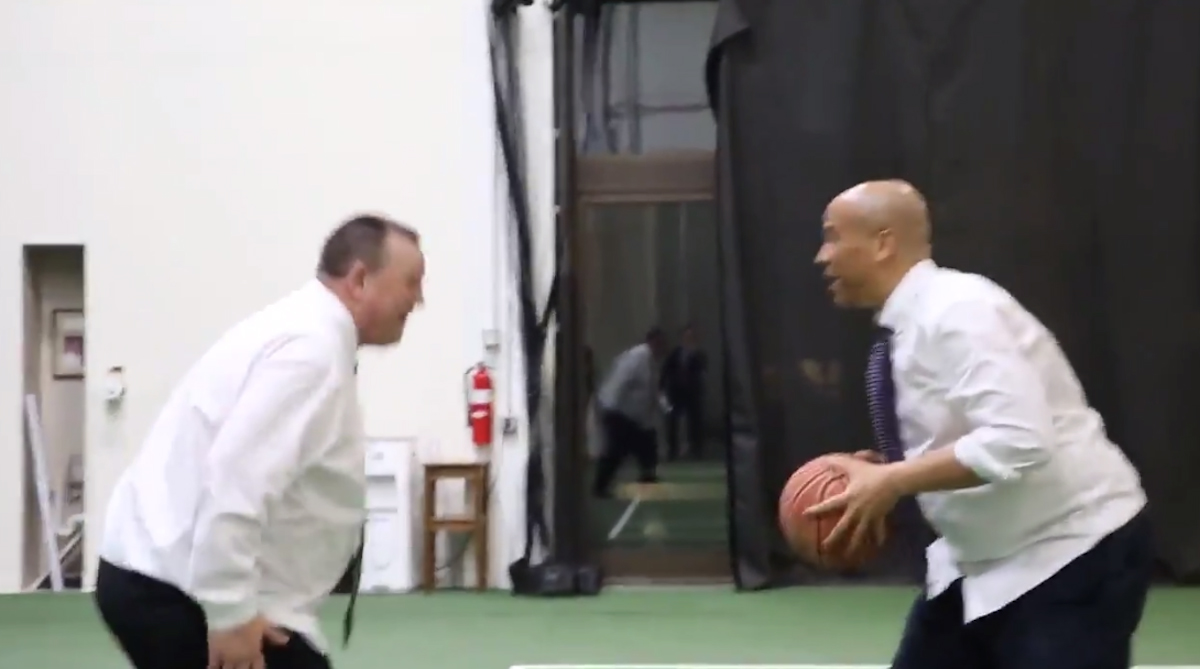 Watch Sen. John Tester Posterize Sen. Cory Booker in Intense 1on1 Basketball Game