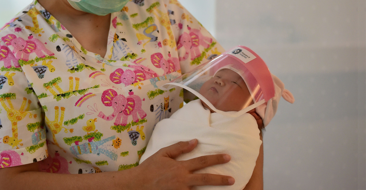PHOTOS Newborn Babies in Coronavirus Face Shields