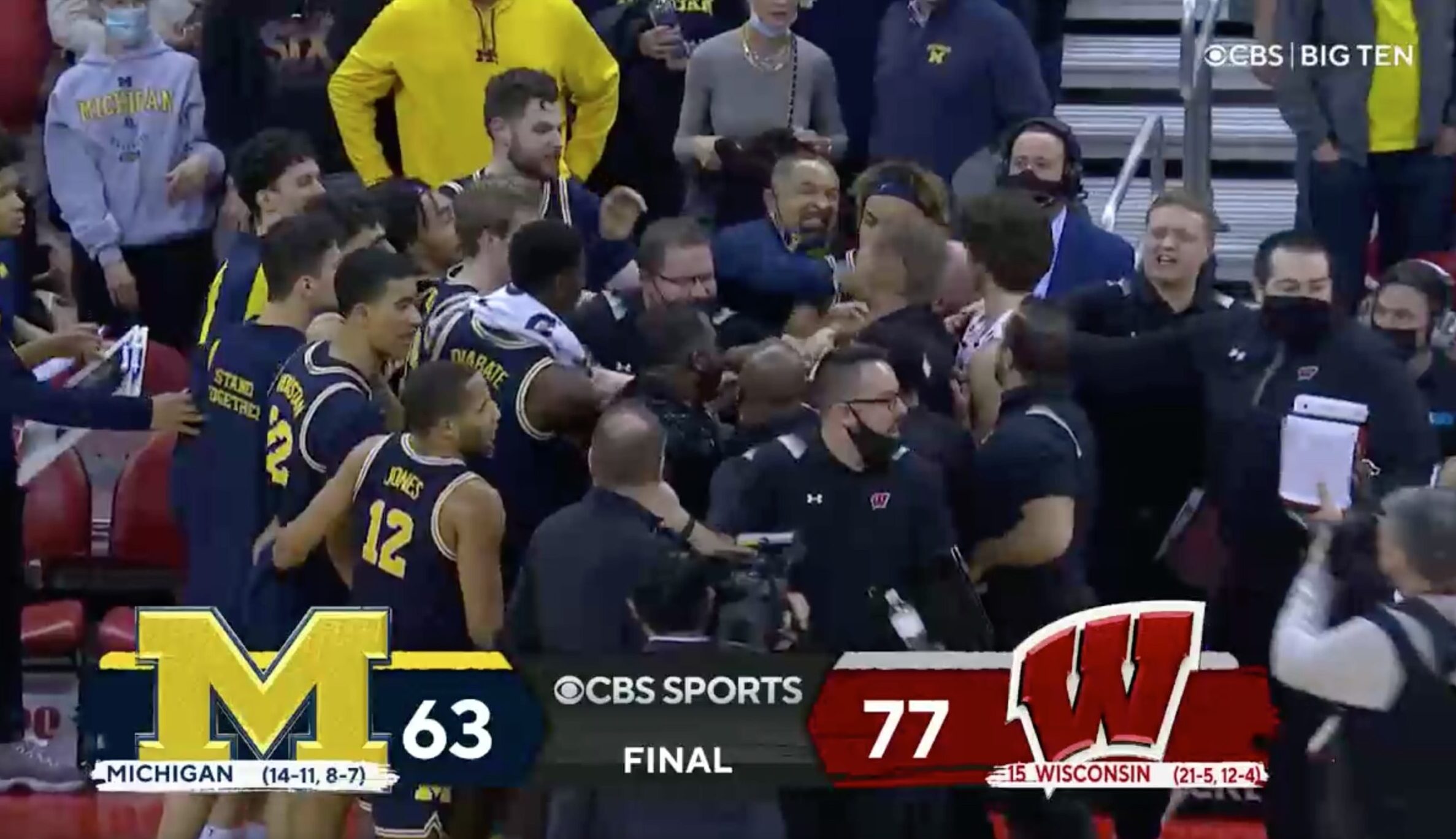 VIDEO Michigan Coach Juwan Howard Punches Wisconsin Coach