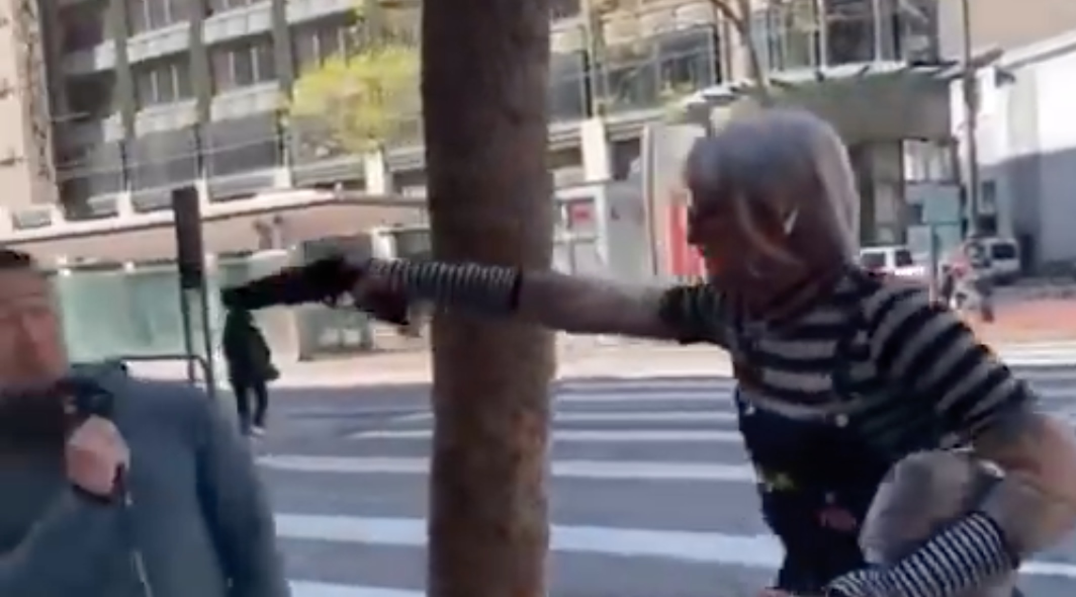 WATCH: Shocking Moment Angry Passerby Pulls Gun on Street Preacher After Trans Remark