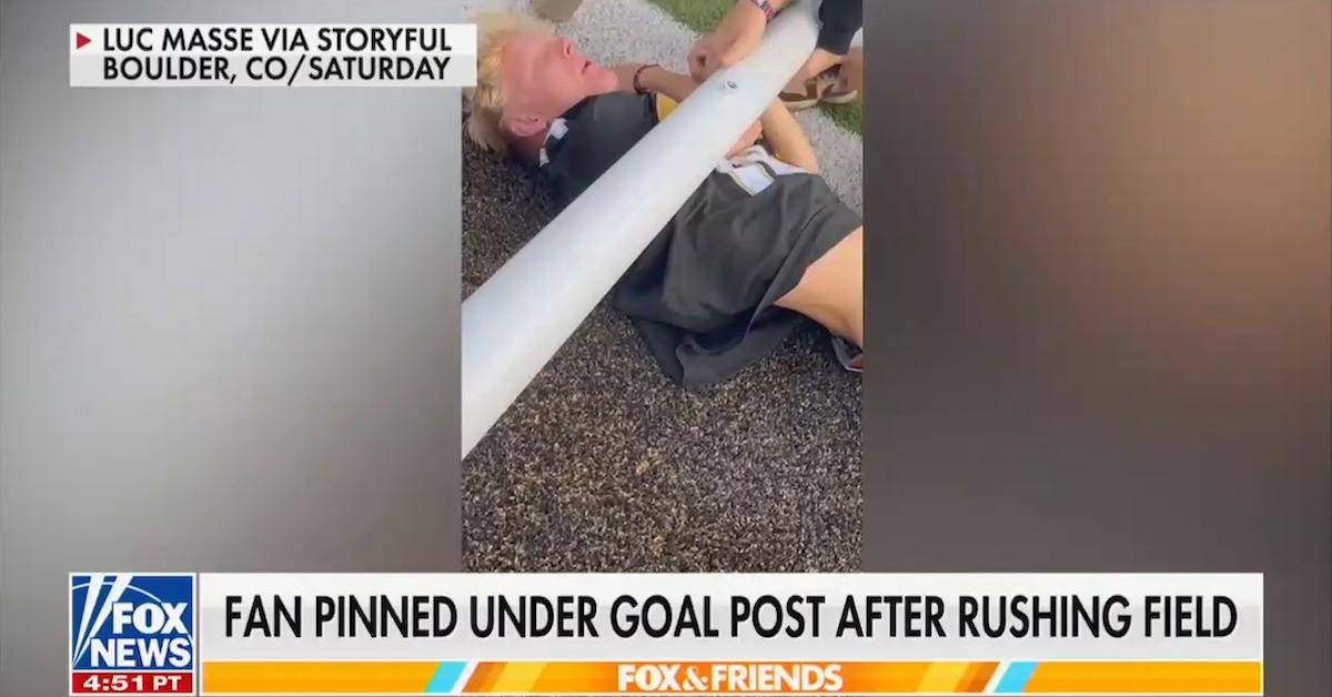 WATCH: Colorado Buffaloes Fan Gets Pinned Under Goal Post