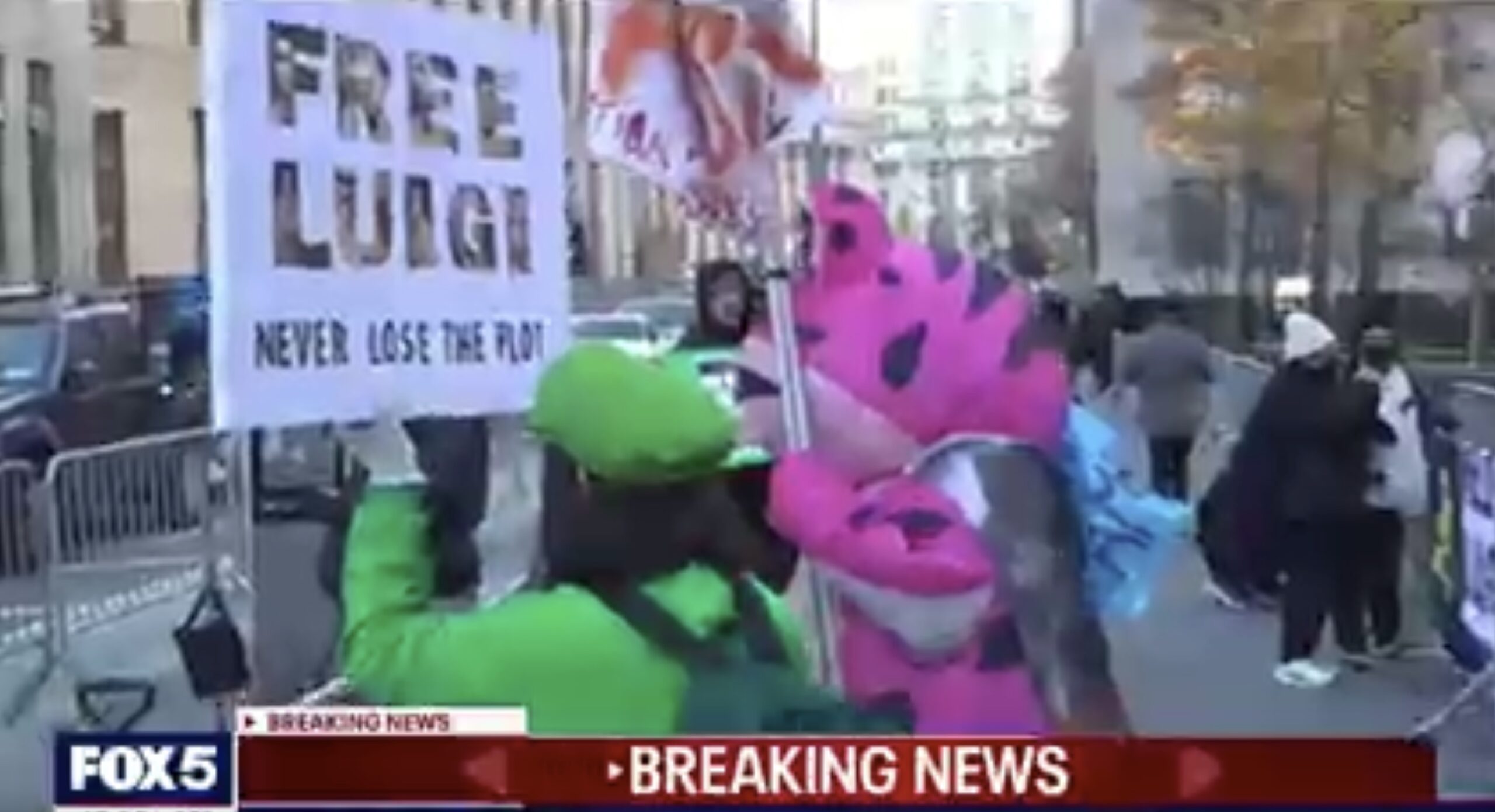 Luigi Mangione's 'Feverish Fans'  Decked Out in Nintendo Outfits  Cheer as He Enters NYC Court