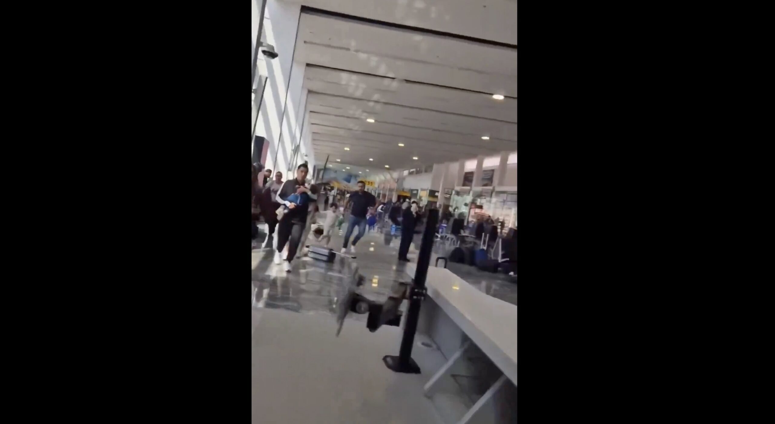 WATCH: Travelers Scramble for Safety as Mexican Drug Cartel Attacks Major Airport Following Killing of Cartel Boss