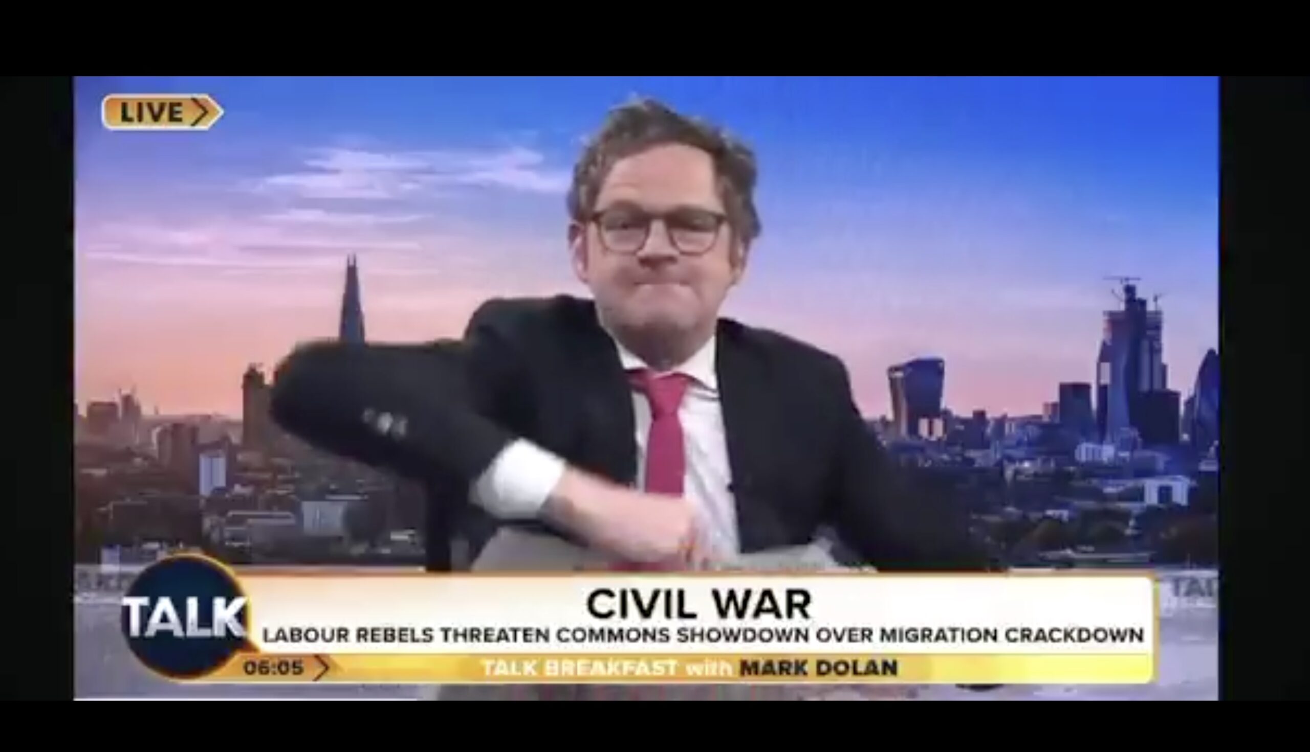 WATCH: British Pundit Throws Newspapers at the Camera During Heated Rant  Causing His Feed to Malfunction