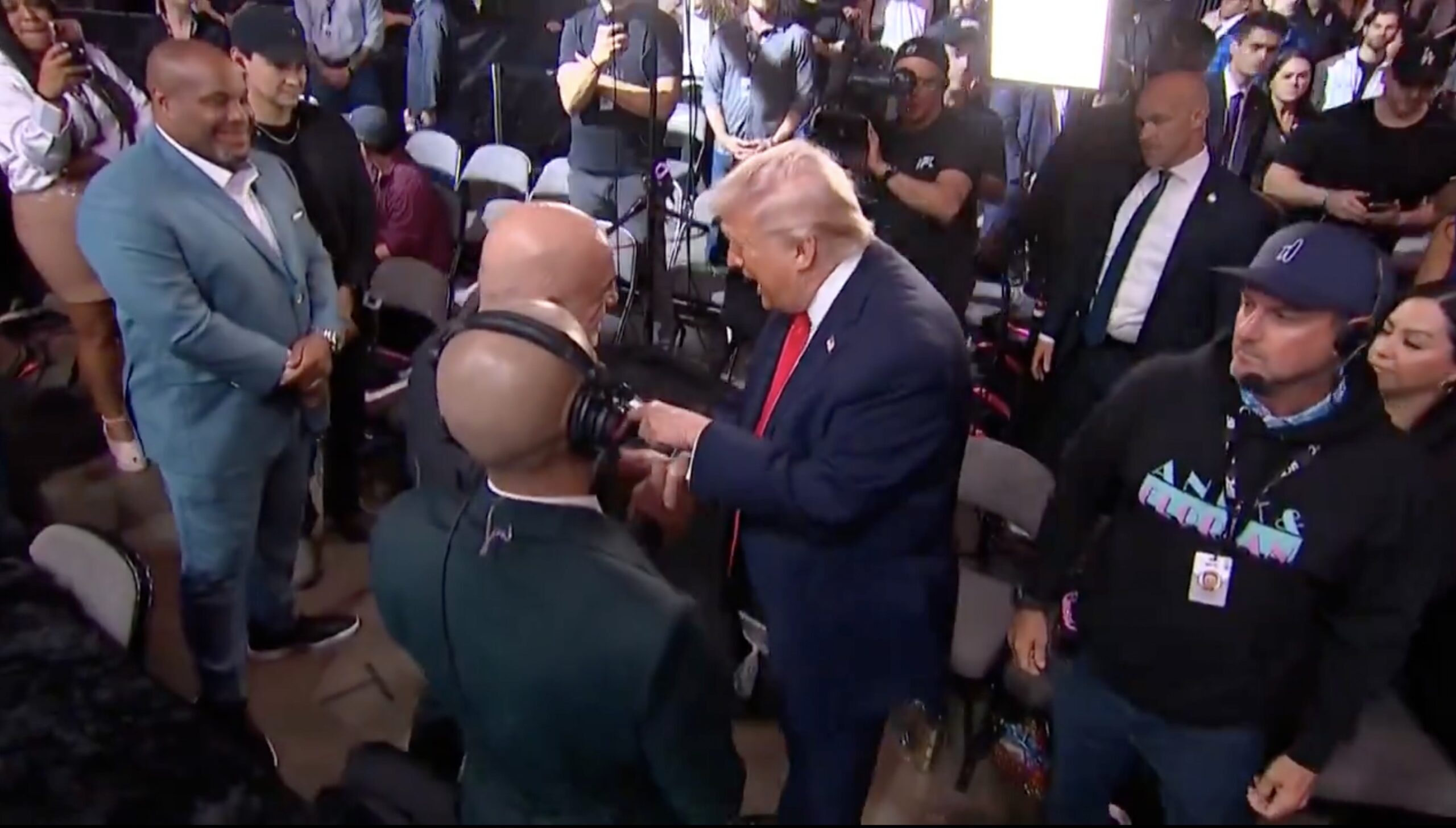 WATCH: Donald Trump Enters UFC 327 to Big Roar  Then Approaches Joe Rogan After Podcast Star Has Ripped Iran War