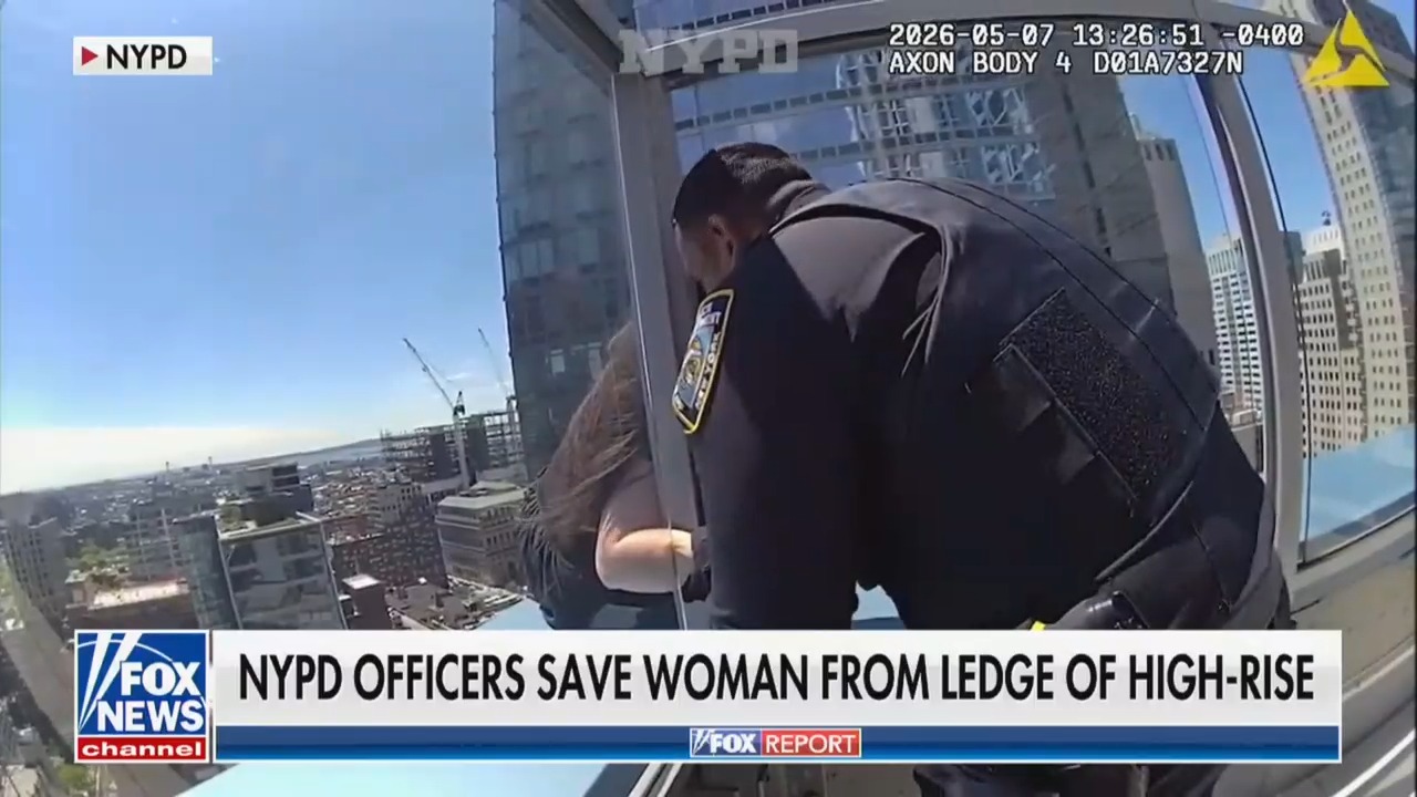 Harrowing NYPD Body Cam Video Shows Cop Saving Suicidal Woman Clinging to a Skyscraper